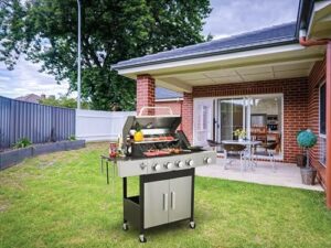 Cook up a camping adventure with this 2-in-1 propane griddle grill combo, featuring 4 burners, side burner, and porcelain-enamel cast iron grate. Perfect for patio or backyard use, with 46,790 BTU gas barbecue grill capabilities.
