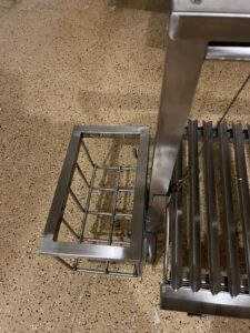 Here is the optimized SEO meta description:

"Experience Argentine-style grilling with the Santa Maria Grill, featuring a built-in BBQ cooking grill and adjustable height V-grate. Perfect for outdoor cooking enthusiasts."