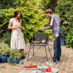 Cook up outdoor adventures with this portable camping stove! Boasting 22,000 BTUs and a detachable grill, it's perfect for picnics. Enjoy easy cooking in the wilderness with its windscreen design.