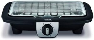 Experience the ultimate outdoor cooking with Tefal's Easygrill 2 in 1 electric barbecue and grill, featuring 2100W power and compact design. Plus, get a plancha for versatile grilling options!