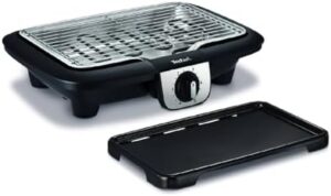 Experience the ultimate outdoor cooking with Tefal's Easygrill 2 in 1 electric barbecue and grill, featuring 2100W power and compact design. Plus, get a plancha for versatile grilling options!