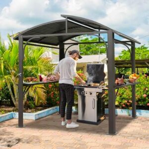 Transform your backyard gatherings with the Domi Hardtop Grill Gazebo, featuring a sturdy double galvanized steel roof and 2 side shelves for ample grilling space. Perfect for patio gardens and backyards!