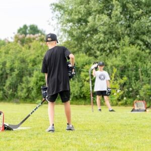 "Master backyard hockey with the Extreme Sauce Combo Double, featuring a mini goal for up to 40 pucks and shooting pad simulating real ice. Practice trick shots and improve your saucer passing skills with this comprehensive training aid."