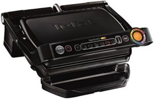 Here is the meta description:

"Grill perfect results with Tefal GC7148's 2000W electric barbecue, featuring a contact grill and cooking surface of 82 cm². Ideal for small spaces, measures just 300x200mm."