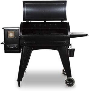 Mastering grilling with the Pit Boss PB1150G PG1150G Wood Pellet Grill! Enjoy 1150 sq. inches of cooking space and a folding front shelf for convenience. Perfect for backyard BBQs, this black grill is ready to sizzle.