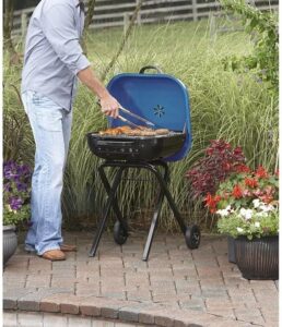Discover the Walk-A-Bout Portable Charcoal Grill with wheels, folding legs and adjustable air vents. Perfect for outdoor BBQs, this grill also features a removable ash pan for easy cleaning.