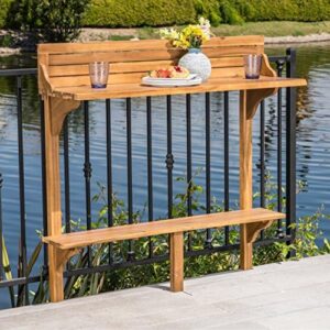 Enhance your outdoor gatherings with the Caribbean Outdoor Acacia Wood Balcony Bar Table, featuring natural stained wood and sturdy construction for a warm and inviting atmosphere.