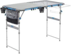 Explore outdoor cooking with the CORE Outdoor Cook Table, featuring adjustable height and storage for accessories. Perfect for beach, picnic, backyard or patio gatherings!