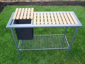 Transform your gardening experience with the Weatherguard Potting Bench, featuring a removable trimmings bin and adjustable shelf for optimal storage and organization.