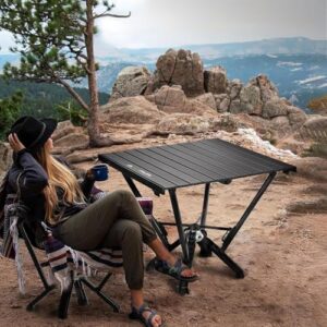 Discover the ultimate outdoor folding table! One-piece die-cast aluminum frame ensures durability. Supports 380 lbs and features a roll-up metal desk, perfect for picnics and BBQs.