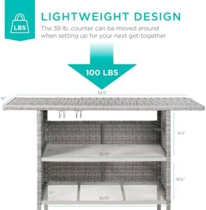 Elevate your backyard gatherings with Best Choice Products' Outdoor Patio Wicker Bar Counter Table, featuring 2 steel shelves and sturdy rails. Perfect for outdoor entertaining!