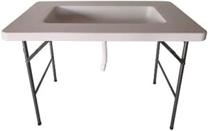 Perfect outdoor companion: Old Cedar Outfitters Fill and Chill Ice Cooler folding table with large sink & drain for cleaning fish and game, plus serving shelf. Stay organized at parties, camping trips or in the wild.