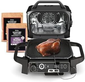 Experience the ultimate grilling and smoking experience with Ninja's Woodfire Pro 7-in-1 grill & smoker. Features thermometer, air fryer, BBQ, bake, roast, and broil settings for perfect results. Perfectly portable and grey in color.