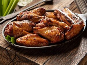 Get sizzling flavors with Burgers' Smokehouse Fully Cooked Chicken Wings in Nashville Hot, a spicy and savory snack for any occasion. Enjoy 4 pounds of finger-licking goodness!