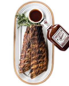 Savor tender and juicy Montgomery Inn Fully Cooked Pork Ribs with ease, now available in a 2-pack for the perfect meal or party.