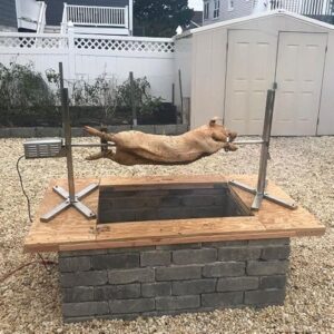 Discover the Ash & Ember 25W Tripod Rotisserie Roaster Stand, rated 125 LB, with adjustable height and stainless steel spit rod. Perfect for roasting pork, chicken, lamb, or goat, this electric BBQ grill stand is a must-have for any outdoor enthusiast!