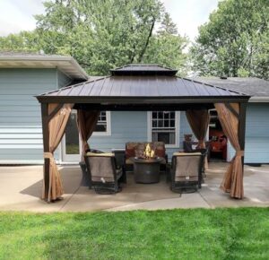 "Transform your outdoor space with the Domi 12'x14' Hardtop Gazebo featuring a sturdy aluminum frame, galvanized steel double roof, and curtains/netting for ultimate weather protection. Perfect for patios, backyards, and lawns."