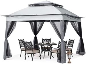 Enhance your outdoor gatherings with the MASTERCANOPY Patio Gazebo's pop-up design and mesh walls for bug-free relaxation. Perfect for small spaces, this dark gray gazebo measures 11x11 feet.