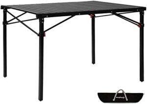 Discover the ultimate portable camping table! This lightweight aluminum alloy table folds up compactly for easy transport, perfect for 4-6 people picnics, camping trips or BBQs.