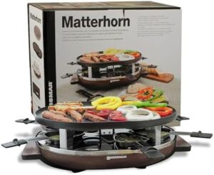 Discover the SwissMar Matterhorn Oval Raclette Table Grill Indoor with reversible cast aluminum non-stick grill plate and wood base, perfect for parties and family bonding. Ideal for 8-person gatherings.