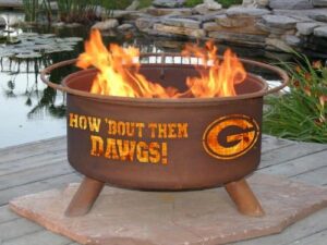 Unlock outdoor gatherings with the Patina F404 University of Georgia Fire Pit, featuring durable steel construction and a unique "UGA" logo. Perfect for tailgating or backyard bonfires!