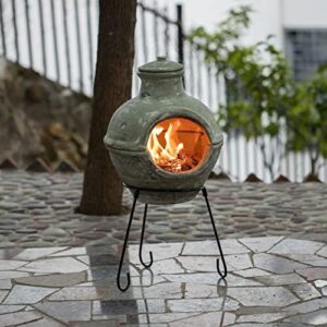 Enrich your outdoor gatherings with this Indoor/Outdoor Beige Clay Chimenea BBQ Grill Fire Pit, featuring a metal stand for stability and accent design for a stylish ambiance.