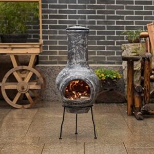 Envision cozy nights by the fire pit! This Gray Outdoor Clay Chiminea features a stoney scribbled design and sturdy metal stand perfect for barbecues, cocktail parties, or family gatherings.