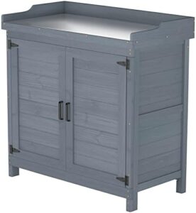 Organize your outdoor patio with this waterproof storage cabinet, featuring a potting bench and work station table for gardening essentials.