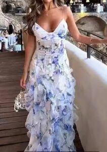 Here is the optimized SEO meta description:

"Elevate your style with this women's summer formal dress featuring spaghetti straps, asymmetrical ruffle details and a flowy maxi design. Perfect for cocktail parties or special occasions."