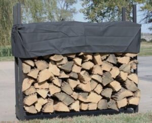 Optimize your outdoor space with the Woodhaven Pioneer 4' Firewood Rack, featuring a steel design, powder coat finish, and durable cover for year-round use. Perfect for campers and backyard enthusiasts!