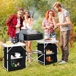 Discover the ultimate camping companion: Tangkula's 2-Tier Aluminum Folding Table with Windscreen, cook station & storage. Perfect for picnics, BBQs, or parties!