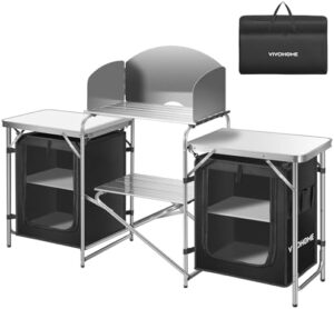 Here is the optimized meta description:

"Compact camping kitchen with storage and stainless steel windscreen. Perfect for outdoor cooking and picnics, this portable cook station includes 2 side tables and foldable design for easy transport."