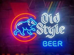 Here is the meta description:

"Brighten up your beer bar with this authentic Chicago Cubs neon sign, handcrafted in multiple sizes. Perfect for pub decor and a must-have for baseball fans"