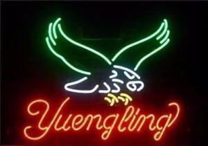 Illuminate your beer cafe with this neon sign, featuring a iconic Yuengling Eagle logo and larger size (20"x16") for maximum visibility. Perfect for bars, stores, or home brews!