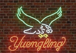 Illuminate your beer cafe with this neon sign, featuring a iconic Yuengling Eagle logo and larger size (20"x16") for maximum visibility. Perfect for bars, stores, or home brews!