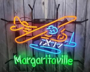 Illuminate your party space with this Jimmy Margaritaville Airplane Sign, a glass neon sign featuring iconic lyrics and dimensions of 24x20 inches. Perfect for beer bars, clubs, bedrooms, or any occasion!