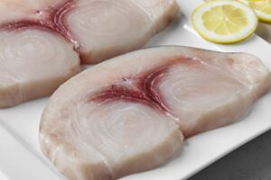 "Savor the freshness of our Domestic Swordfish Steaks, 7 lbs, with 14 tender pieces. Gourmet seafood delivered right to your door - enjoy a flavorful experience"