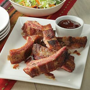 Get deliciously smoky flavor at home with these premium hickory-smoked pork baby back ribs, hand-rubbed and fully cooked to perfection. Perfect for BBQ enthusiasts!