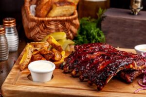 Savor tender baby back ribs smothered in zesty BBQ sauce, now with 4 racks of mouthwatering flavor. Perfect for special occasions or everyday indulgence.