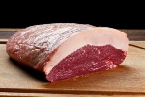 Discover the Wellborn 2R Ranch Picanha Roast, a premium sirloin cap perfect for Brazilian-style BBQ. Enjoy grass-fed grain finished tenderness and flavor in every bite, now at a discounted price!