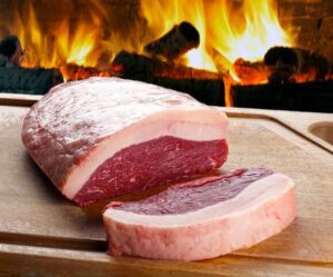 Discover the Wellborn 2R Ranch Picanha Roast, a premium sirloin cap perfect for Brazilian-style BBQ. Enjoy grass-fed grain finished tenderness and flavor in every bite, now at a discounted price!