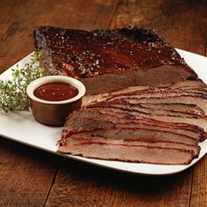Savor the rich flavor of Premium Tender Smoked Beef Brisket by Kansas City Steak Company, fully cooked and perfect for BBQs and family gatherings. Rich, tender meat with 2 x 28 oz briskets, ideal for sharing.