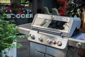 Here is the optimized SEO meta description:

"Experience outdoor grilling like a pro with Monument Grills' 4-burner propane gas grill, featuring 62,000 BTU power and a side burner. Perfect for patio gatherings, this stainless steel grill offers knob controls and a compact design."