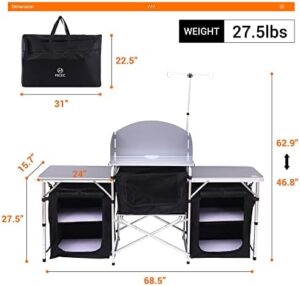 Discover the ultimate camping companion: Nice C's Folding Kitchen Table with Light Stand and Windshield Cooking Station. Perfect for outdoor adventures, beach trips, BBQs, picnics, indoor use or office needs, this versatile table comes with 3 organizers and a carry bag.