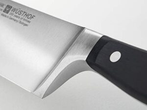 Discover precision and efficiency with the Wusthof Classic Ham Slicer, featuring a hollow edge for effortless cutting. Perfect for home cooks and chefs alike, this stainless steel slicer makes quick work of ham, turkey, and more.