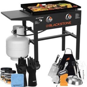 Cook up a meal anywhere with the Blackstone 28" Original Griddle Cart, featuring a portable outdoor flat top grill perfect for camping & tailgating. Includes accessories kit, griddle seasoning & gloves.
