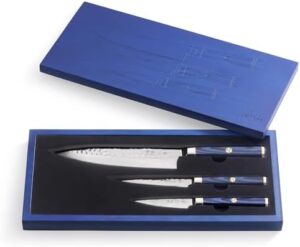 Unlock a culinary experience with Cangshan's KITA Series 3-Piece Starter Knife Set featuring high carbon X-7 Damascus steel blades and an ash wood box. Perfect for beginners and pros alike, this set includes 8" chef, 3.5" paring, and 4.75" serrated utility knives.