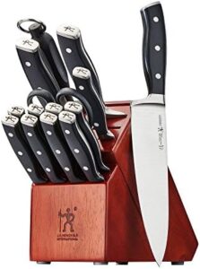 "Elevate your culinary experience with the Henckels Forged Accent 15-pc Knife Block Set, featuring precision-forged blades and a stylish storage block perfect for any kitchen. Limited time offer: receive a complimentary cookbook with purchase!"