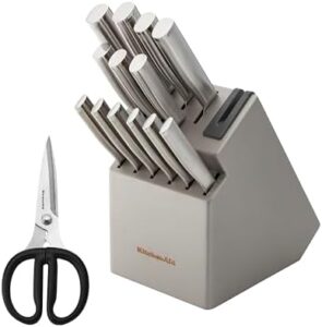 Discover the ultimate kitchen companion - KitchenAid's 15-piece gourmet knife block set with built-in sharpener. Includes stainless steel knives for precise cuts and effortless sharpening. Perfect for home cooks and professional chefs alike, this premium set is a must-have for any kitchen.