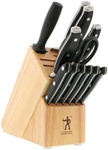 Elevate your cooking experience with the Henckels Forged Premio 13-Pc Knife Set. Includes chef, paring, utility, and steak knives plus a storage block, all crafted in stainless steel and featuring a light brown finish.